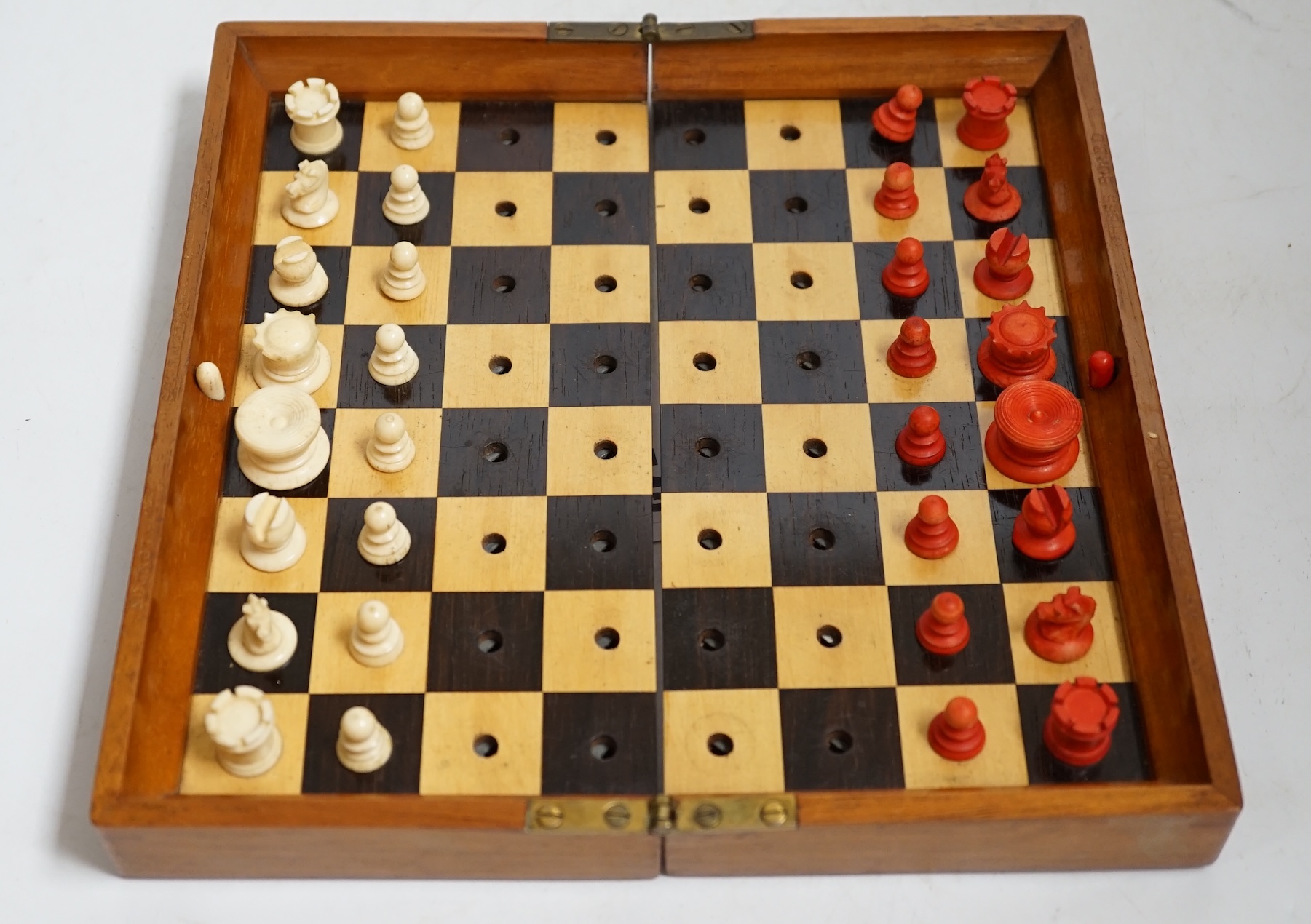 A Jaques in Statu Quo travelling chess set with bone pieces, leather slip case. Condition - fair